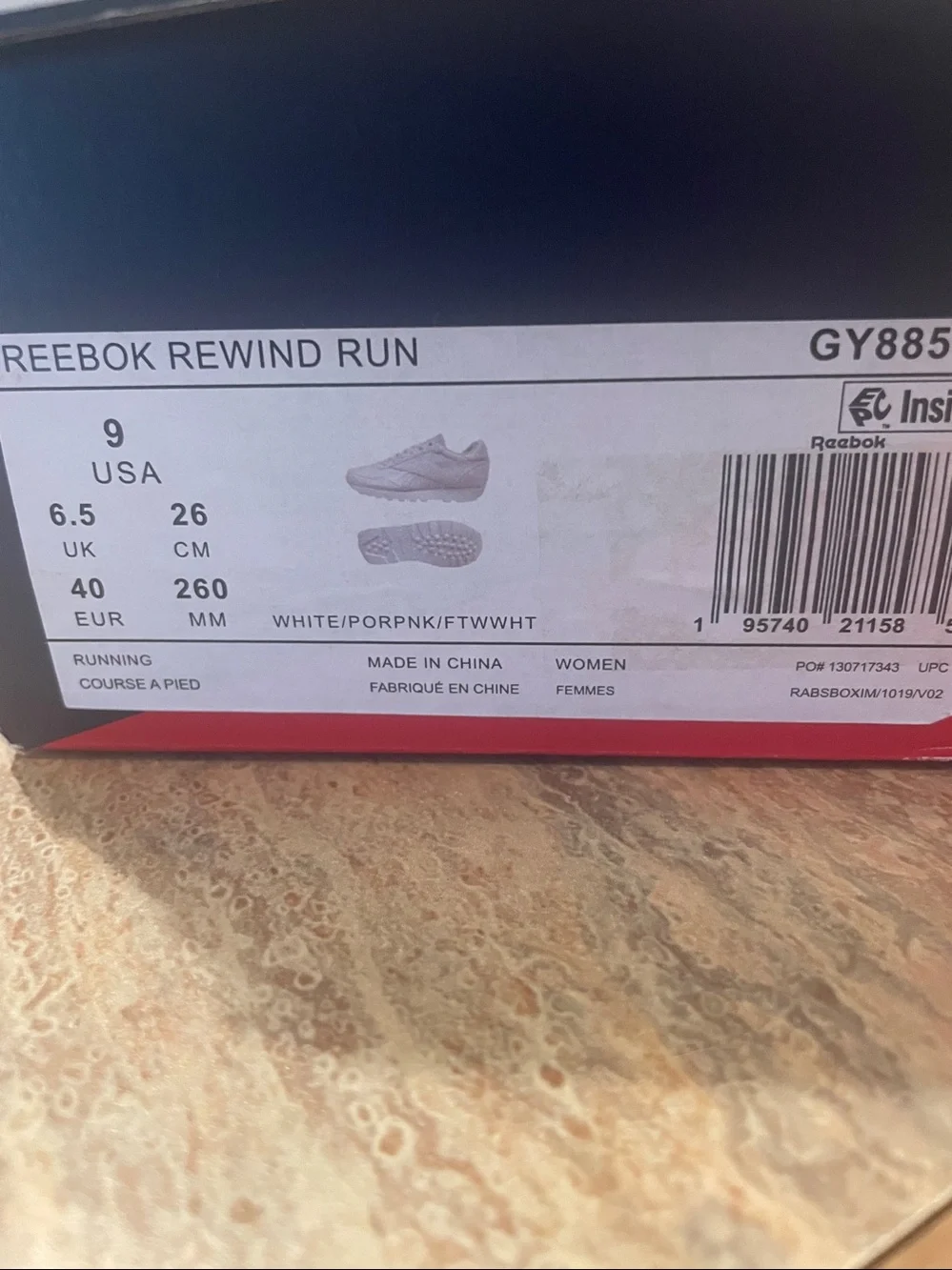 Reebok Women's Classic White Sneakers with Pink Accent size 9
